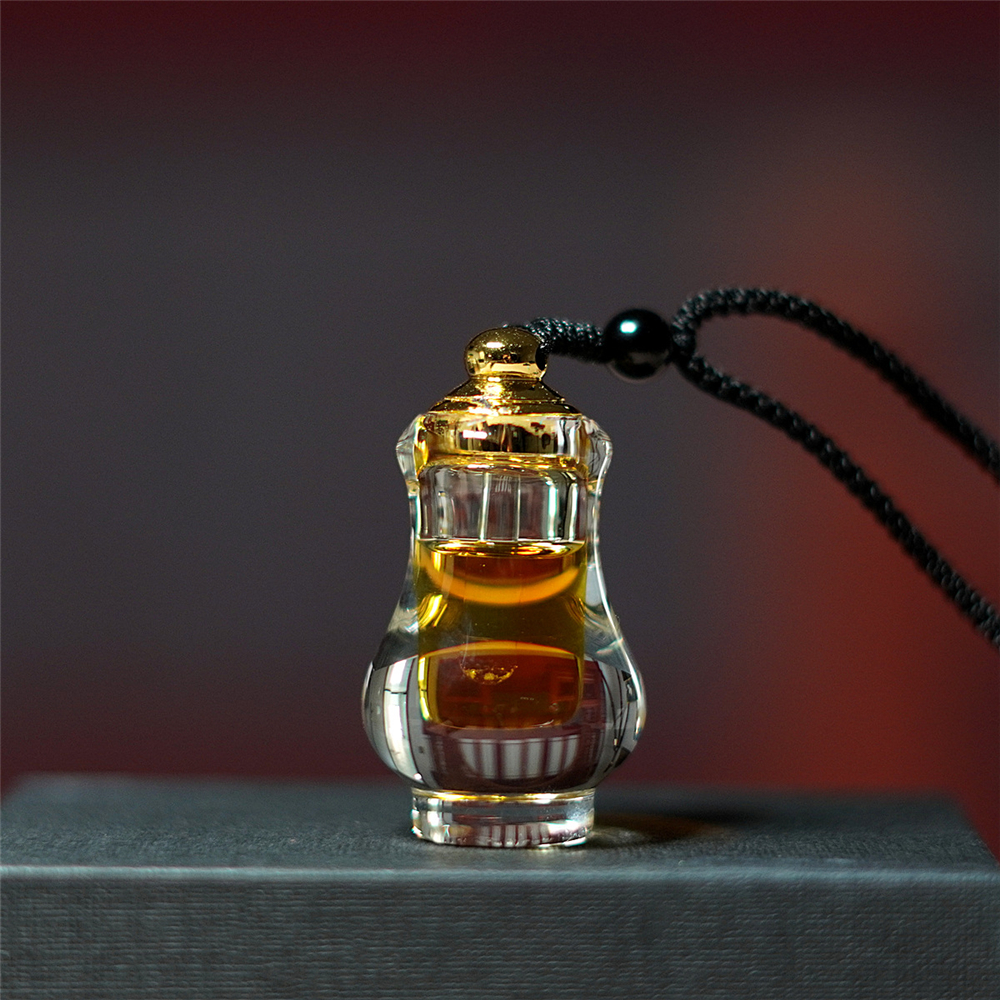 Agarwood Essential Oil Pendant - Body Jewelry Co review and price