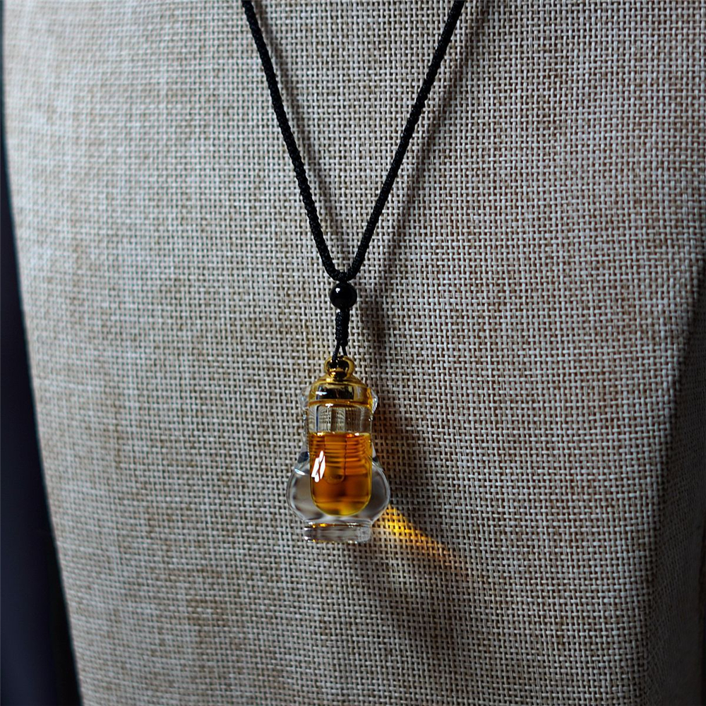 Agarwood Essential Oil Pendant - Body Jewelry Co review and price